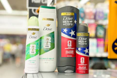 dove body washes and deodorant on a store shelf