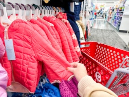 cat & jack jackets sitting on a target shelf