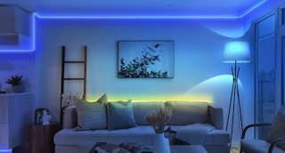 a living room with LED light strips blue and yellow