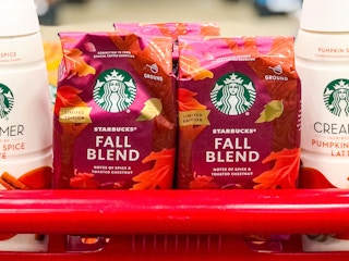 bags of Starbucks Fall Blend ground coffee in a Target cart