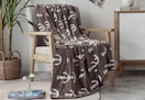 coffee anchor throw blanket sitting in a chair