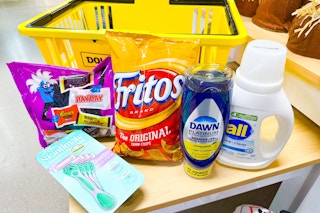 groceries in front of a dollar general shopping basket