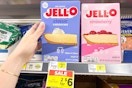 hand holding a box of jell-o cheesecake