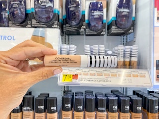 hand holding covergirl trublend undercover concealer bottle at walmart