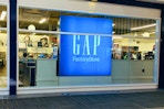 A woman shopping in a GAP store
