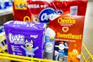 cheerios, luvs, charmin, glade, febreze products in a yellow shopping cart