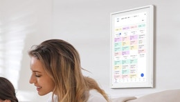 a digital calendar on a wall
