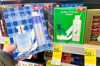 person holding a nautica gift set by the display