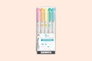 zebra highlighters on a pink background
