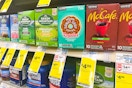 boxes of kcups on a shelf with $4.99 sale tags