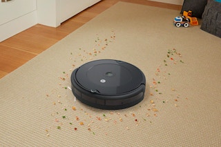 Robot vacuum cleaning over debris