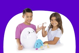 kids unboxing a mystery egg toy