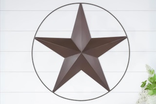 Lifestyle image of star Mainstays Wall Decor hanging on wall