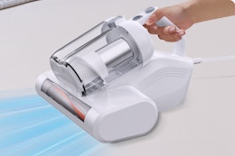 Vacuum being used on furniture