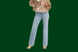 Close up shot of a woman wearing a pair of Jessica Simpson jeans with leopard jacket