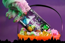a spooky hand reaching into a halloween bucket and pulling out a Boo Books booklet from Wendy's