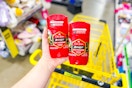 hand holding old spice deodorant at dollar general