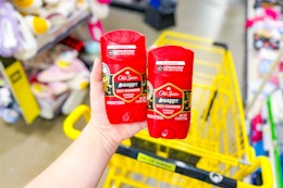 hand holding old spice deodorant at dollar general