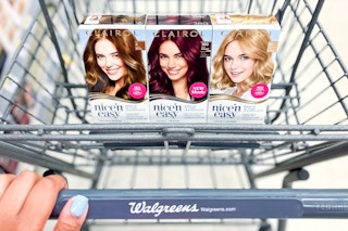person pushing a walreens cart with clair nice'n easy hair dye