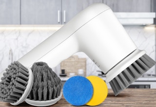 electric scrubber and attachments on table