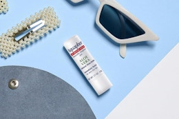 lip balm next to other small objects