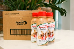 premier protein shakes next to box