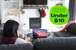 lady sitting on a couch on her computer