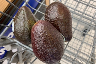 three avocados in a walmart cart