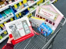 hand holding a cremo gift set over a shopping cart