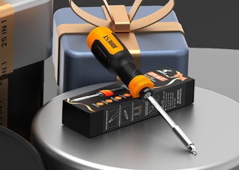 a screwdriver on a box on a table