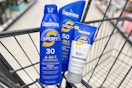 3 coppertone sunscreens in a cart