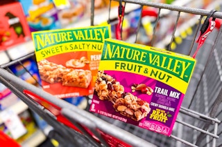 2 boxes of nature valley granola bars in a cart