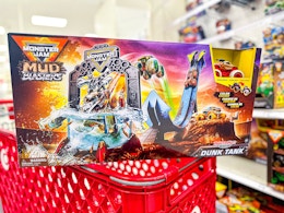 monster jam mud blasters dunk tank sitting on a target cart