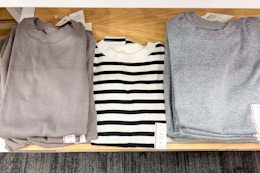 women's tees and tank tops sitting on a target shelf