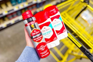 hand holding old spice deodorants