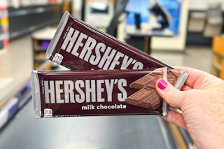 hand holding hersheys chocolate bars
