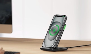 a phone on a wireless charger on a table