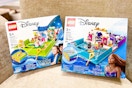 lego disney storybook sets on a couch