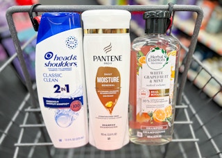 one bottle of head & shoulders shampoo, herbal essences shampoo, and Pantene shampoo in shopping cart