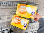 hand holding swiffer duster kits