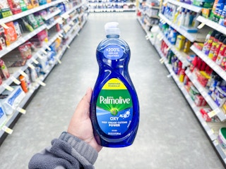 hand holding palmolive dish soap in walgreens