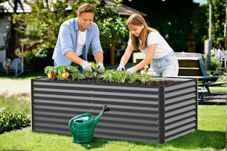 Lifestyle image of a raised garden bed being used outdoors by two people