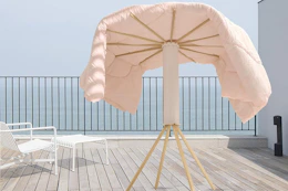 a clothes drying rack on a patio
