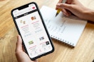 Stop and shop digital coupons on the app with a shopping list next to it.