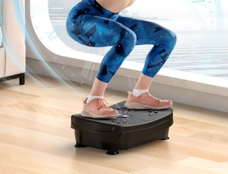 a person standing on a vibration plate