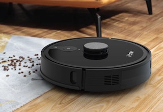 a black iHome robot vacuum