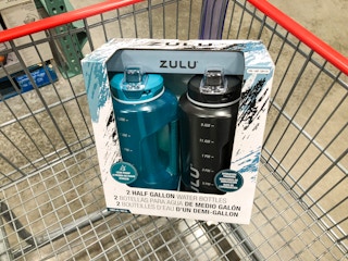 motivational water bottles in a cart