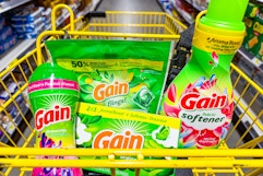 gain flings, fabric softener, dryer sheets, fireworks in a yellow shopping cart
