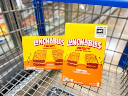 two boxes of lunchables grilled cheesies in walmart cart