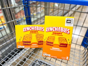 two boxes of lunchables grilled cheesies in walmart cart
